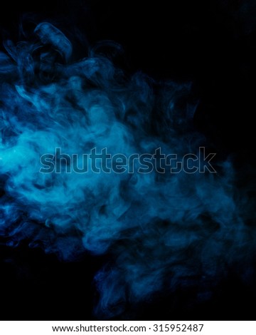 Abstract blue hookah smoke on a black background. Photographed using a gel filter. The concept of of unhealthy.