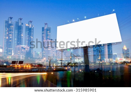 double exposure of blank billboard on city night