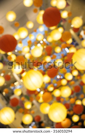 Colorful lantern lamp in shopping mall blurred