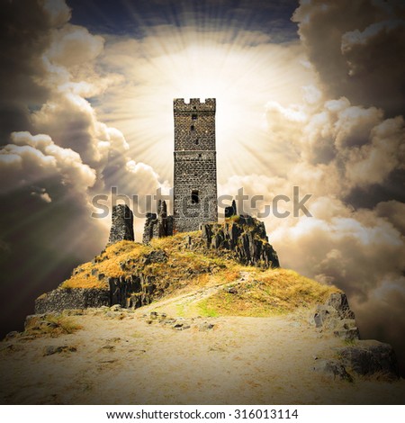 Romantic scenery with ruins of gothic castle on a cliff edge. Warm filtered picture.