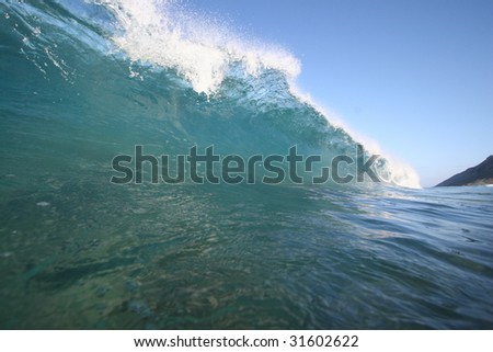 a wave breaking close to shore