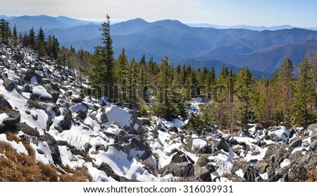 Panorama of winter mountains, wild landscape, taiga, Primorye, Far East of Russia