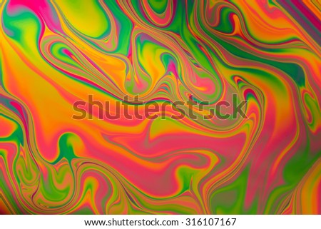 Psychedelic abstract formed by light reflecting off soap bubble