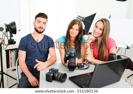 group of young photographer student on photography shooting workshop course indoor in a photo studio