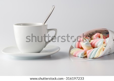 Twisted marshmallow on white background