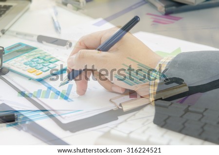 business documents with charts growth, keyboard and pen.  business concept