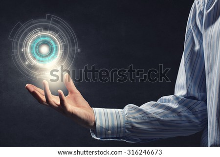 Close up of businessman holding media concept in palm