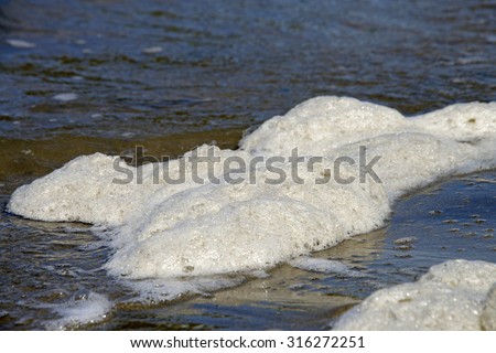 Sea foam is created by the agitation of seawater when it contains higher concentrations of dissolved organic matter including proteins and lipids from the offshore breakdown of algal blooms