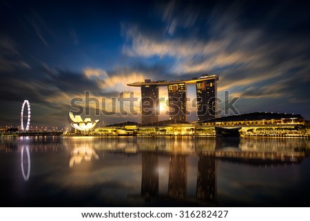 Beautiful sunrise at marina bay, Singapore city skyline, Singapore Royalty-Free Stock Photo #316282427