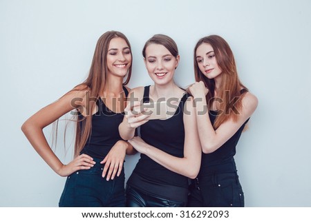 Beautiful Young Girls Taking a Selfie Photo with Phone