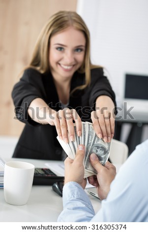 Woman taking batch of hundred dollar bills. Venality, bribe, corruption concept