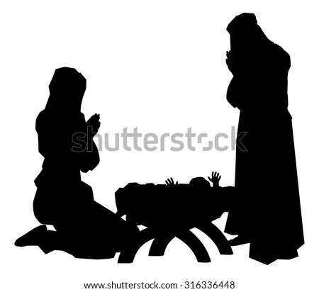 Traditional religious Christian Christmas Nativity Scene of baby Jesus in the manger with Mary and Joseph in silhouette