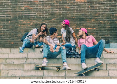 Skateboarder friends on the stairs, made selfie photo