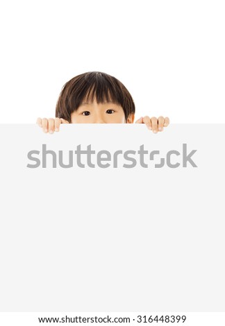 happy little Boy holding a blank banner