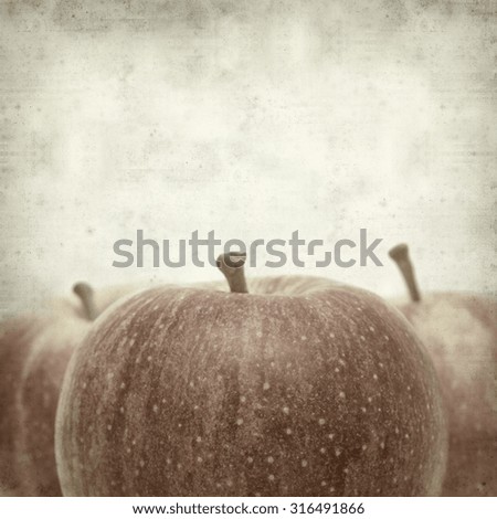 textured old paper background with apples
