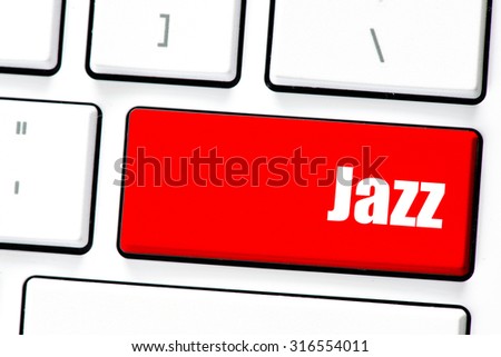 Computer white keyboard with jazz. Computer white keyboard