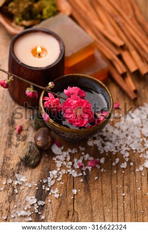 Spa setting on old wooden board