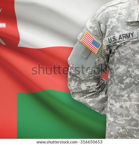 American soldier with flag on background series - Oman