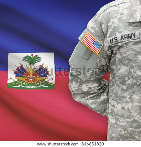 American soldier with flag on background series - Haiti