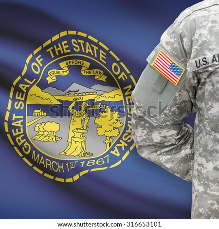American soldier with US state flag on background series - Nebraska