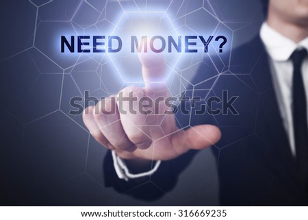 Businessman pressing button on touch screen interface and select "need money?". 