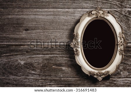 Golden vintage frame on wood texture background, Objects with clipping paths for design work