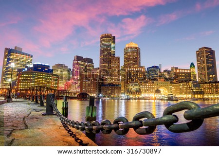Boston Harbor and Financial District at twilight, Massachusetts in USA.

