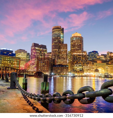 Boston Harbor and Financial District at twilight, Massachusetts in USA.
