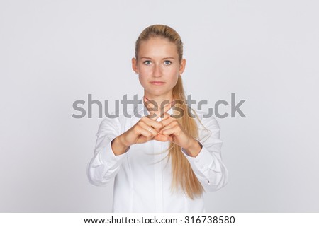 Woman showing stop gesture