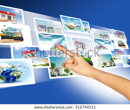 Hand touching holographic pictures on abstract background