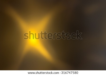 Abstract background in orange and brown colors.