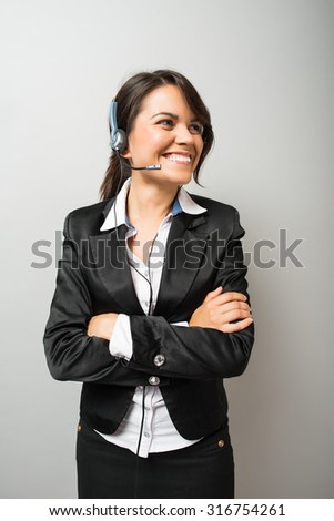 woman worker, call center operator with phone headset 