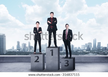 Business person standing on the podium. Business reward concept