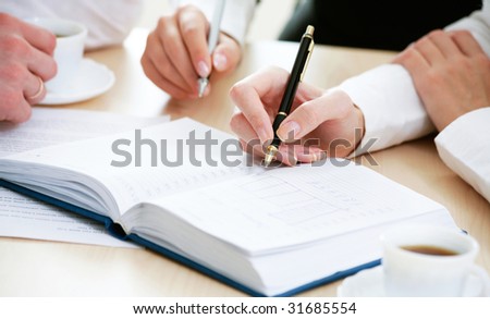 Image of people?s hands while business planning