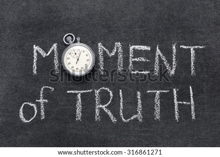 moment of truth phrase handwritten on chalkboard with vintage precise stopwatch used instead of O Royalty-Free Stock Photo #316861271