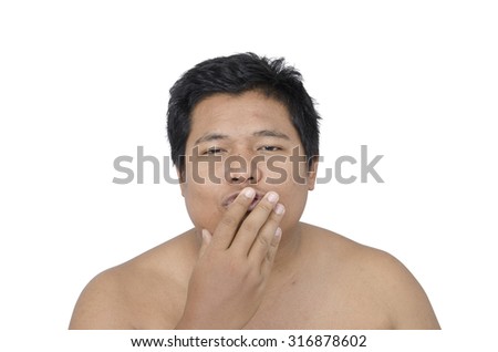 Thai man finger on lips on white background