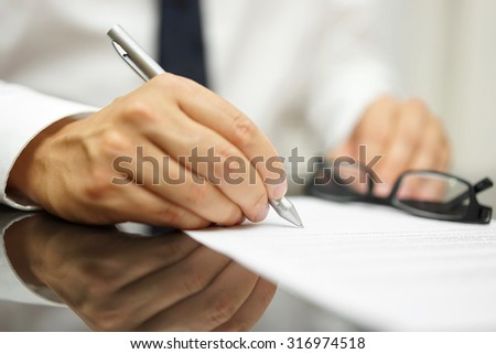 After a review of the sales contract Businessman finished deal Royalty-Free Stock Photo #316974518