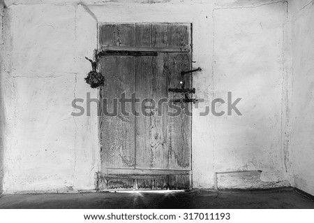 old wooden door. black and white picture