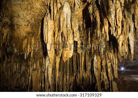 Beautiful stalactites inside Chompol cave in Rachaburi province Thailand(The picture was taken in plublic place where photography and usage are allowed) 