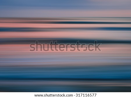 Abstract motion blur sunset nature background on the sea