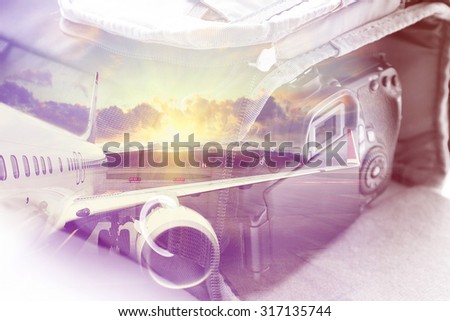 Double exposure: carrying case for the camera and an aircraft. Business and travel concept. Vintage style filtered picture