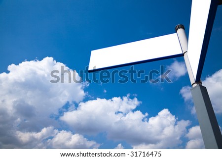 the road sign with the blue sky background.