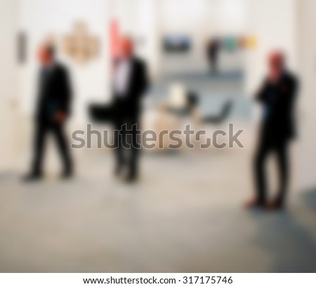 Art gallery, generic background, intentionally blurred post production.