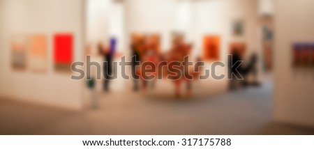Paintings gallery exhibition, generic background, intentionally blurred post production.