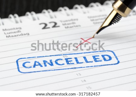 Seal cancelled stamped on paper planner Royalty-Free Stock Photo #317182457