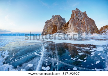 Mount Shamanka or Cape Burkhan on siberian lake Baikal at winter Royalty-Free Stock Photo #317192927