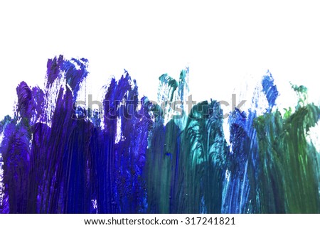 Brush strokes of blue paint isolated over white