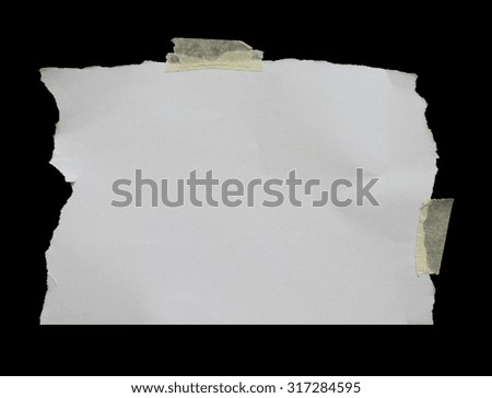 ripped paper on dark background