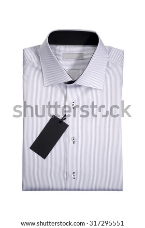 Perfectly folded white striped shirt with empty sales tag isolated on white
