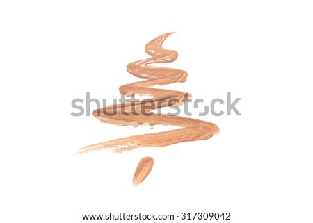 Christmas tree from the foundation. New Year card. Makeup. Stylized foundation. Holiday card. 